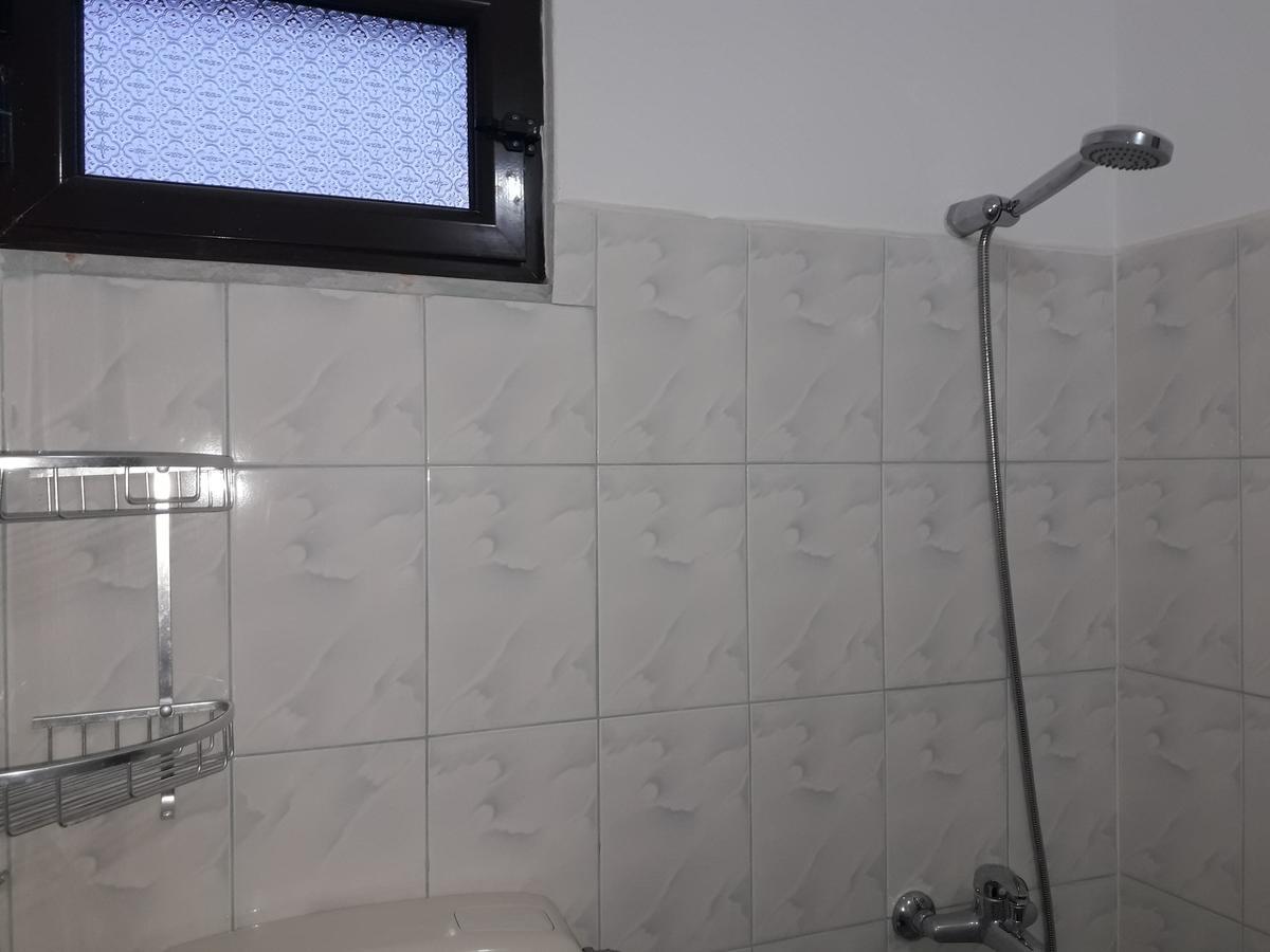 Tani'S Guesthouse Ксамил Екстериор снимка